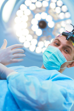 Male surgeon on background in operation room