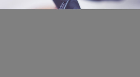 Cosmetologist applying permanent make up on eyebrows