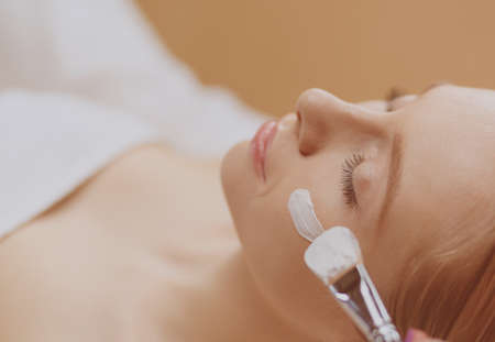 Spa facial mask application. Spa beauty organic facial mask application at day spa salonの写真素材