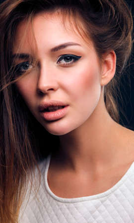 Portrait of a beautiful woman , isolated on black background. Portrait of a beautiful womanの写真素材