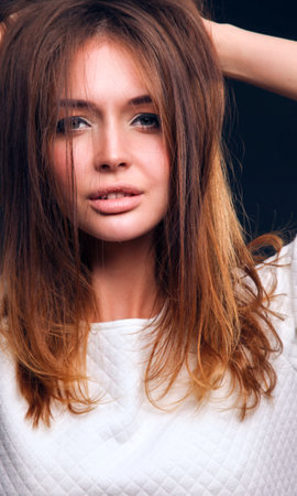 Portrait of a beautiful woman , isolated on black background. Portrait of a beautiful womanの写真素材