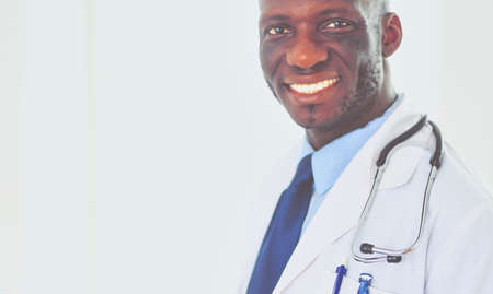 Male black doctor worker with tablet computer standing in hospitalの写真素材