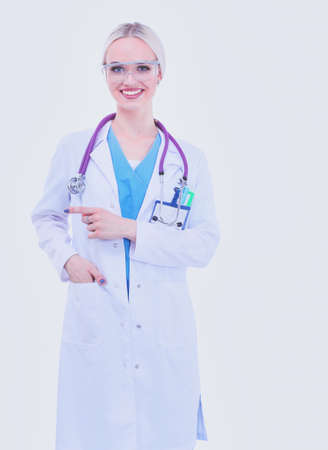 Portrait of female doctor standing against isolated on white background. Woman doctor.の写真素材