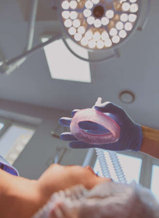 Man surgeon at work in operating roomの写真素材