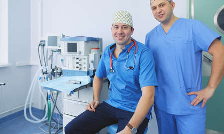 Male surgeon on background in operation roomの写真素材