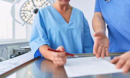 Man surgeon at work in operating roomの写真素材