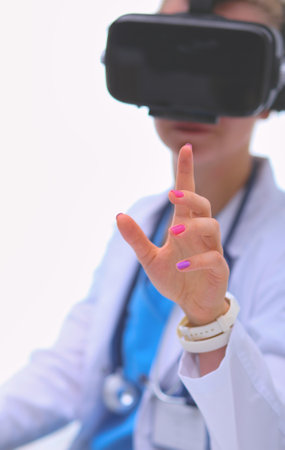 Doctor woman looking through phoropter during eye exam. Doctor womanの写真素材