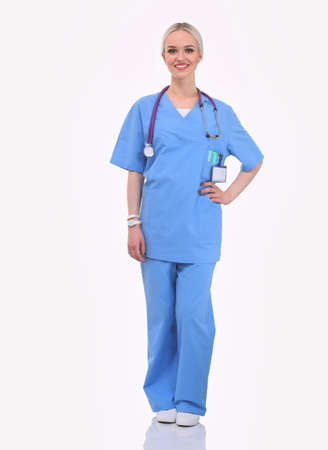 Portrait of female doctor standing against isolated on white background. Woman doctor.の写真素材