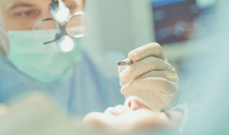 Team surgeon at work in operating roomの写真素材