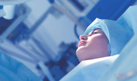 Man surgeon at work in operating roomの写真素材