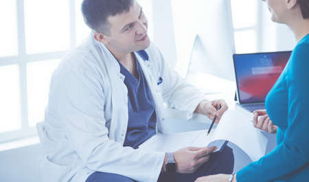 The patient and his doctor in medical officeの写真素材