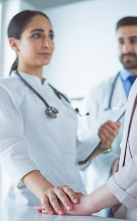 Healthcare and medical concept - doctor with patient in hospitalの写真素材