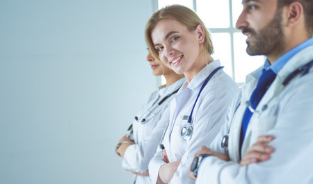 Portrait of confident doctors with arms crossed at medical officeの写真素材