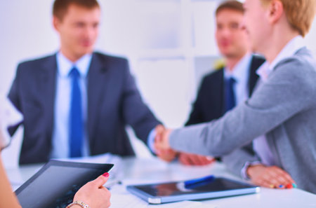 Business people shaking hands, finishing up a meetingの写真素材
