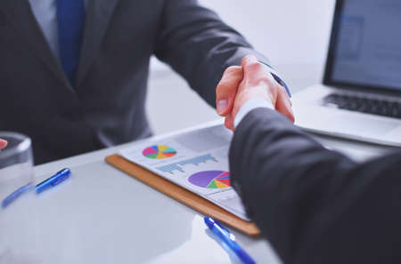 Business people shaking hands, finishing up a meetingの写真素材