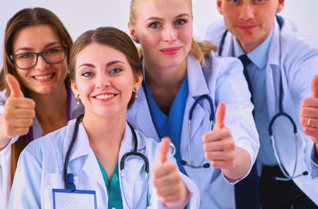 Portrait of doctors team showing thumbs upの写真素材