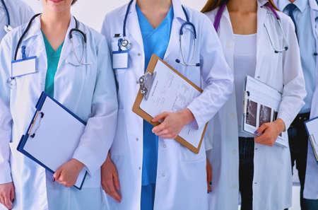 Portrait of group of smiling hospital colleagues standing togetherの写真素材