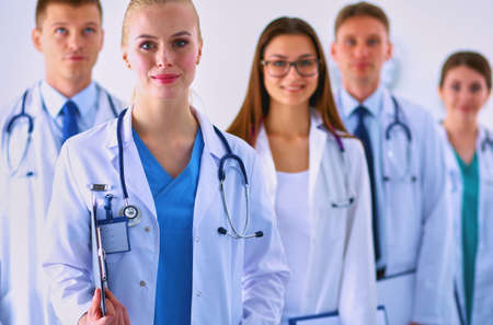 Portrait of group of smiling hospital colleagues standing togetherの写真素材