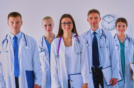 Portrait of group of smiling hospital colleagues standing togetherの写真素材