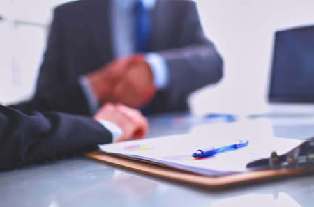 Business people shaking hands, finishing up a meetingの写真素材