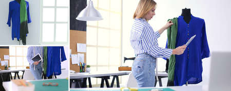 Fashion designer working on her designs in the studioの写真素材