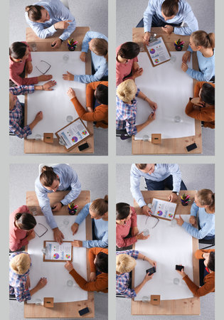 Business people sitting and discussing at business meeting, in officeの写真素材