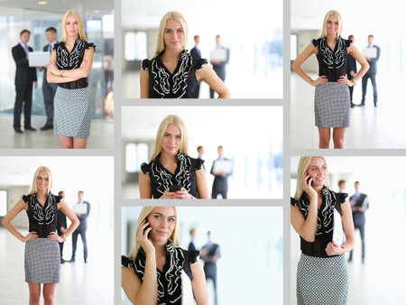 Business woman standing with her staff in background at modern officeの写真素材
