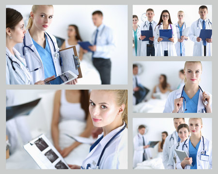 Woman doctor standing with stethoscope at hospitalの写真素材
