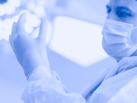 Man surgeon at work in operating roomの写真素材
