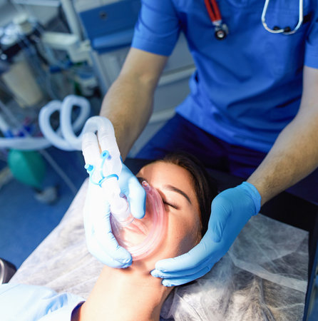 Man surgeon at work in operating roomの写真素材