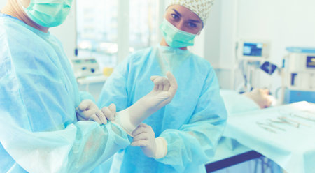 Male surgeon on background in operation roomの写真素材