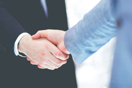 Business people working together at desk, white backgroundの写真素材
