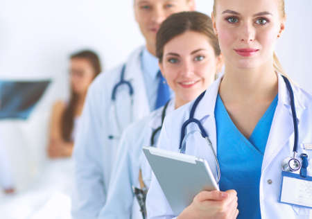 Portrait of group of smiling hospital colleagues standing togetherの写真素材