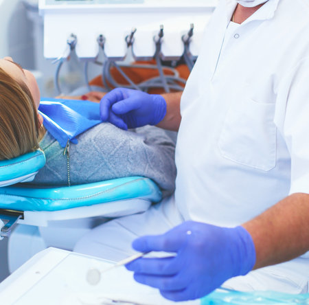 Doctor and patient in the dental clinicの写真素材