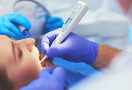 Doctor and patient in the dental clinicの写真素材