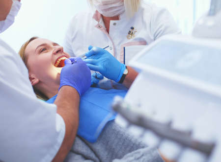 Doctor and patient in the dental clinicの写真素材