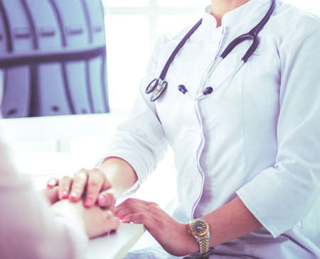 Healthcare and medical concept - doctor with patient in hospitalの写真素材