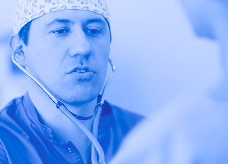 Man surgeon at work in operating roomの写真素材