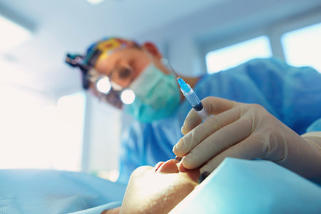Male surgeon on background in operation roomの写真素材