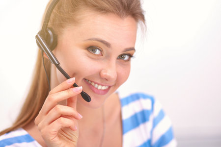 Woman with documents sitting on the deskの写真素材