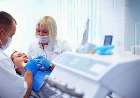 Doctor and patient in the dental clinicの写真素材