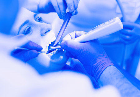 Doctor and patient in the dental clinicの写真素材