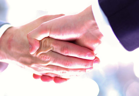 Business people working together at desk, white background