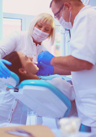 Doctor and patient in the dental clinicの写真素材