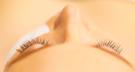Spa facial mask application. Spa beauty organic facial mask application at day spa salon.の写真素材