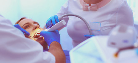 Doctor and patient in the dental clinicの写真素材