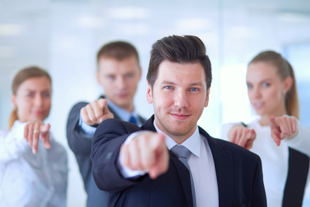 Group of business people pointing to you .の写真素材