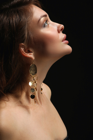 Portrait of beautiful young woman face. Isolated on white background.の写真素材