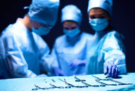 Team surgeon at work in operating roomの写真素材