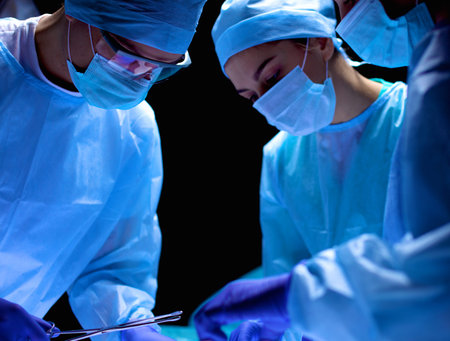 Team surgeon at work in operating room
